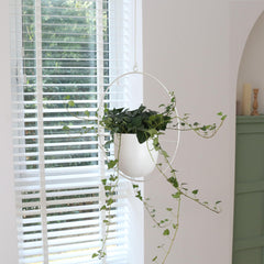 ABETREE planter suspended from ceiling illustrates hanging installation and vertical styling benefit