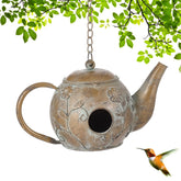 Aifeorzo teapot birdhouse front view showing vintage charm and shelter benefit