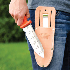 A.M. Leonard blade closeup highlighting serrated edge for cutting fibrous roots