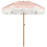 AMMSUN front view of tasseled umbrella showing coverage and style