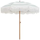 AMMSUN umbrella front view showing boho fringe and welcoming shade benefit