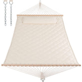 ANOW cream hammock front view showing full spreader bars and quilted bed for comfortable lounging