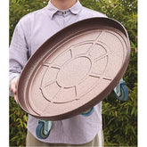 ARTLINE front view of 20 inch round plant stand showing sturdy tray and rim protecting pot