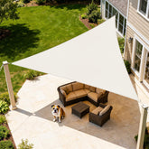 Artpuch cream triangle full view showing patio shade and UV protection benefits