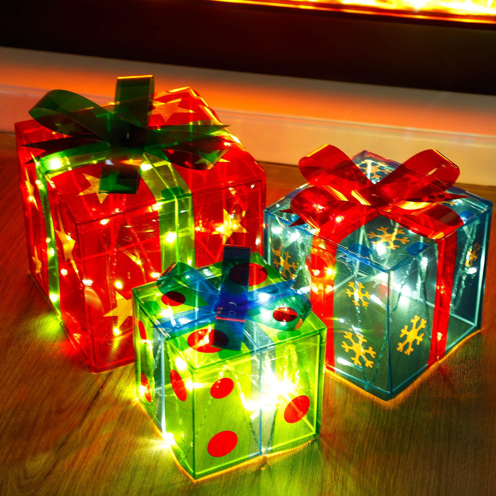 ATDAWN front view of three lighted gift boxes showing festive glow