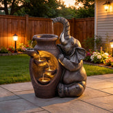 AUTODAYA front view of elephant fountain showing rustic charm and focal appeal