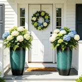 AUTO DAYA front view of two turquoise planters showing curb appeal