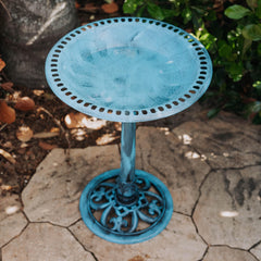 Backyard Expressions bird bath in garden attracting birds and enhancing landscape