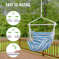 Backyard Expressions hammock chair in patio setting with person relaxing illustrating lifestyle benefit