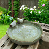 Bakayoyo ceramic bird bath front view showing elegant green finish and shallow bowl, inviting birds.
