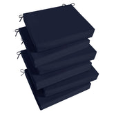 Basic Beyond front view of six navy cushions showing coordinated set and quick styling benefit
