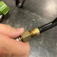 Bayou Classic close-up of stainless braided hose showing durable protection