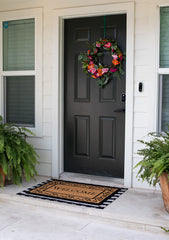 BIRDROCK HOME mat in use at a front door preventing dirt from entering home