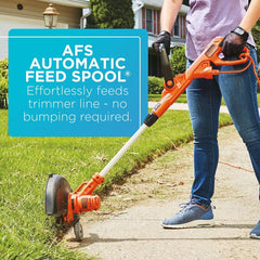 BLACK+DECKER BESTA510 trimming sidewalk grass offering fast cleanup and neat edges
