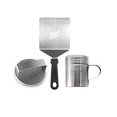 BLACKSTONE 5024 front view of the kit showing press, spatula, and spice dredge for durable grilling