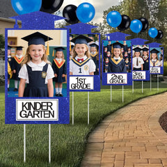 Briwooody front row display of 13 blue graduation photo signs showing sequence and visual impact