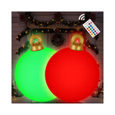 Btanadi front view of two flashing inflatable ornament balls showing festive brightness