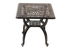 C/G patio casa front view of copper side table showing stable curved legs and ornate look