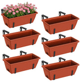CADUKE front view of six red planter boxes showing neat organized display and curb appeal