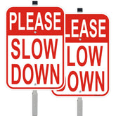 Cefrashi front view of two reflective slow down signs showing clear message