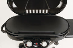 Coleman griddle in use at campsite cooking pancakes for convenient outdoor meals