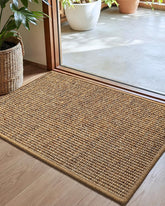 Color&Geometry jute rug front view showing natural sisal brown and welcome benefit