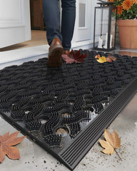 Color&Geometry front view of black heavyweight outdoor welcome mat showing stable fit
