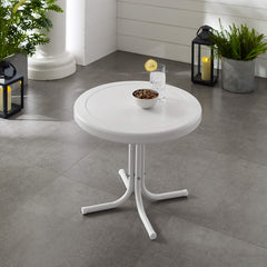 Crosley Griffith table in use with iced drink showing convenience and outdoor readiness