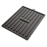 Cuisinart silicone grill mat on side table protects surface from grease