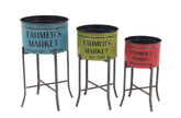 deco 79 front view of three multicolored planters showing rustic finish and visual balance