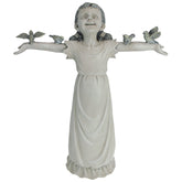 Design Toscano front view shows joyful girl statue adding charm