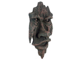 Design Toscano front view of greenman face showing lifelike expression and charm