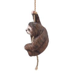 Design Toscano Horatio hanging in tree with rope, creates whimsical garden accent