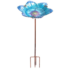 DREAM GARDEN front view of blue glass bird bath adding color and function