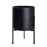 D'vine Dev front view of black cylinder planter with stand showing elegant display