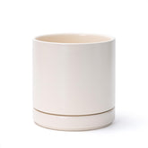 D'vine Dev front view of oatmeal ceramic planter showing clean modern shape and neutral tone