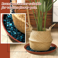 Eccliy saucer under a large ceramic planter catching runoff, prevents spills