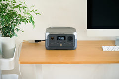 EF ECOFLOW RIVER 2 side ports closeup showing AC and USB outputs for device flexibility