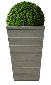 Emsco Group front view of tall resin planter adding curb appeal