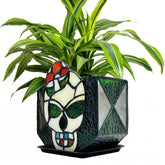 Entlityful skull planter front view showing colorful stained glass and decorative appeal