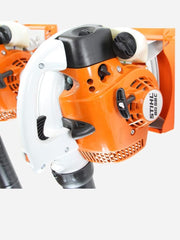 Farm-Garage Solutions mounted rack holding Stihl blower saves floor space