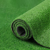 Fasward front view of 6 x 15 ft artificial grass rug showing neat roll and label, easy-install benefit