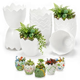 Ferrochef front view of six white dinosaur egg planters showing coordinated centerpiece benefit