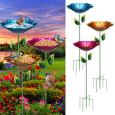 Ferrochef front view of three colorful flower bird baths attracting birds