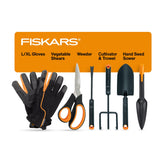 Fiskars front packaging showing all six gardening tools and benefits