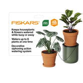 Fiskars front view of lifewell system showing elegant jug and stand benefits tidy watering