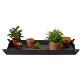 Fiskars repotting mat unfolded showing full workspace and surface protection