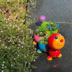 FKKsparkler side profile of metal caterpillar planter highlighting playful silhouette