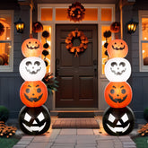 Fourluoo front view of two lit pumpkins adding curb appeal