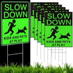 Fumete front view of green slow down signs showing pack and visibility benefits